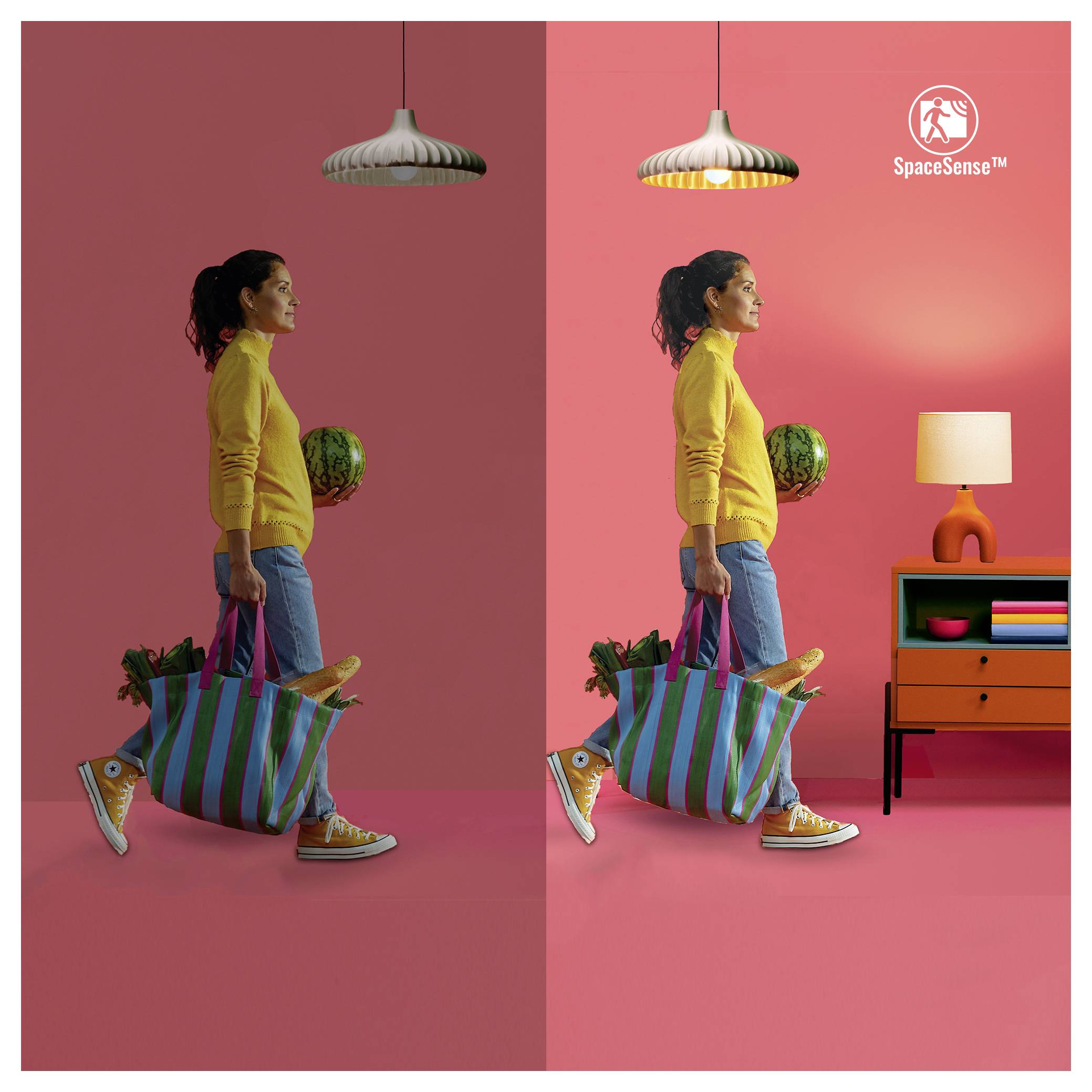 A person in a yellow sweater carries a striped bag and lettuce, with differing lighting on a red background; 'SpaceSense' logo top right.