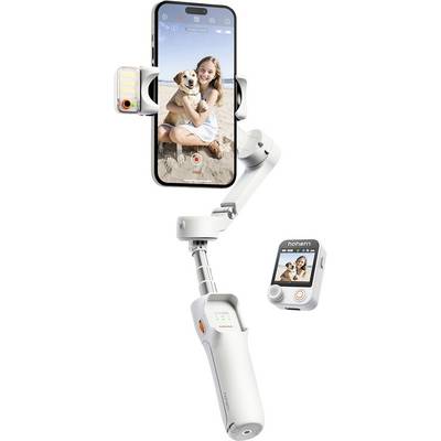 A smartphone mounted on a white handheld stabilizer displays a woman smiling and holding a dog on a beach, showcasing stabilization capability.