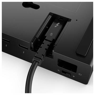 A Thunderbolt cable plugged into a port labeled with a lightning bolt icon and the number '5' on a black electronic device.