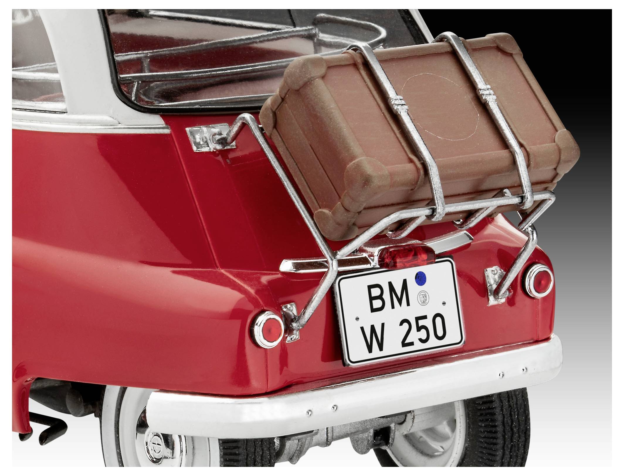 A red car with a luggage rack holding a brown suitcase. The license plate reads 'BM W 250'. Tail lights and rear bumper visible.