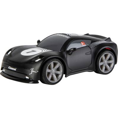 A black toy race car with the number '7' on the hood and a racing emblem on the side, featuring silver rims and a sleek design.