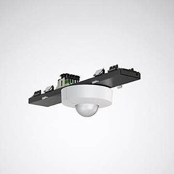 Ceiling-mounted circular motion sensor with a glossy white dome and black rectangular base, equipped with wires and connectors.