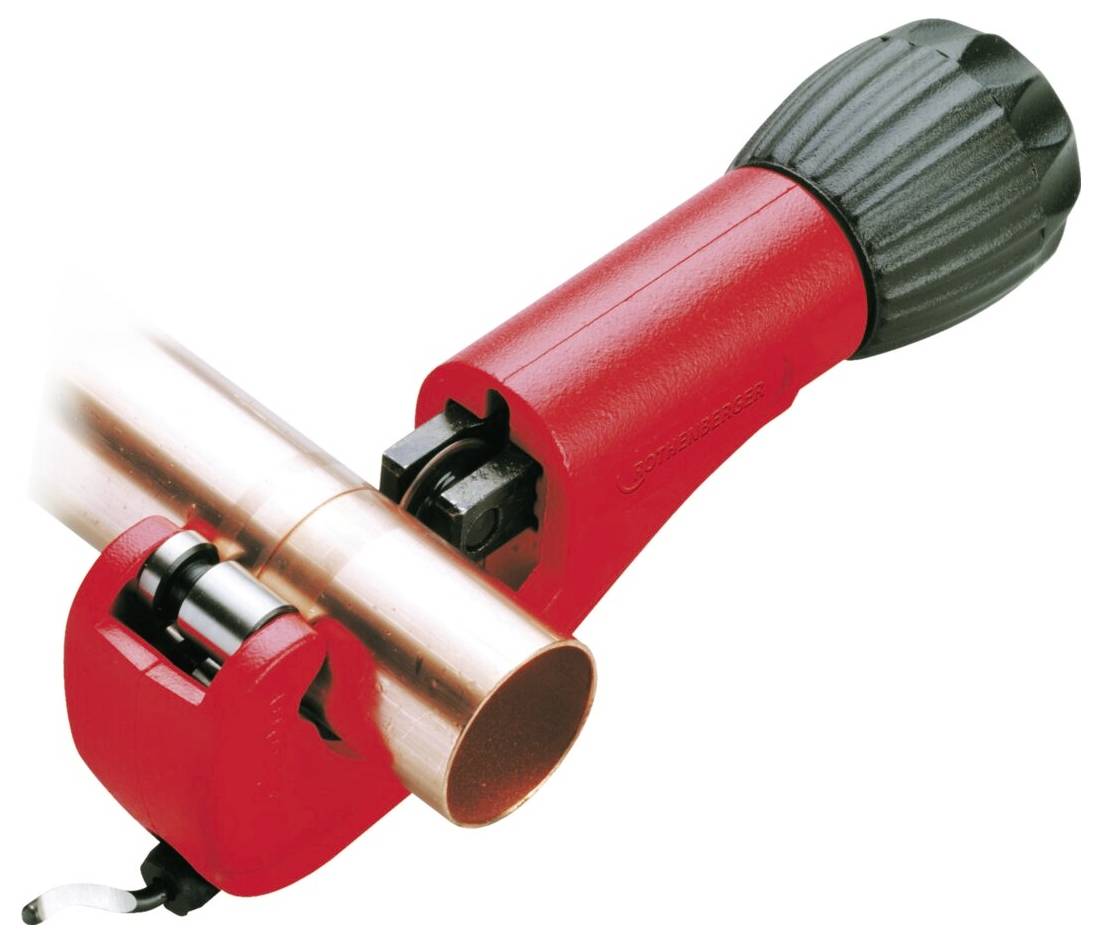 A red pipe cutter encircles a copper pipe, with a black handle for twisting to cut the pipe.
