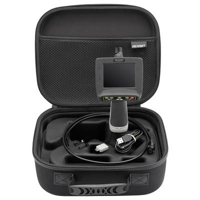 Open carrying case containing a Voltcraft inspection camera with screen, probe, USB cable, and accessories.