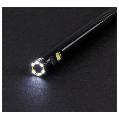 Black handheld LED flashlight on a dark surface, shining a bright circular beam.