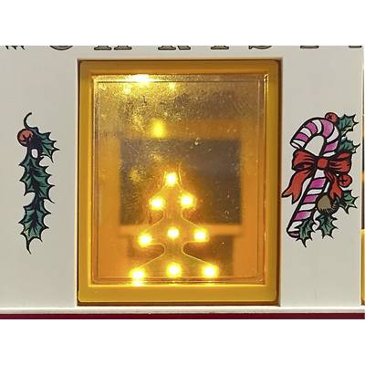 A glowing outline of a Christmas tree is lit within a small, square frame, surrounded by festive holly and candy cane decorations.