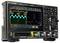 A digital oscilloscope with a waveform displayed on its screen, showing signal frequencies and various control buttons on the right side.