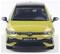 A yellow car model with a 'Golf R' emblem on the front grille, facing forward. The design is sleek, with a visible Volkswagen logo.