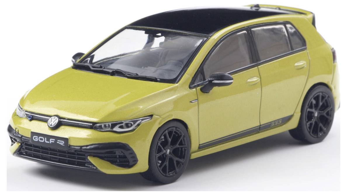 A yellow model car with a black roof and black wheels, resembling a modern hatchback with detailed features and design elements.
