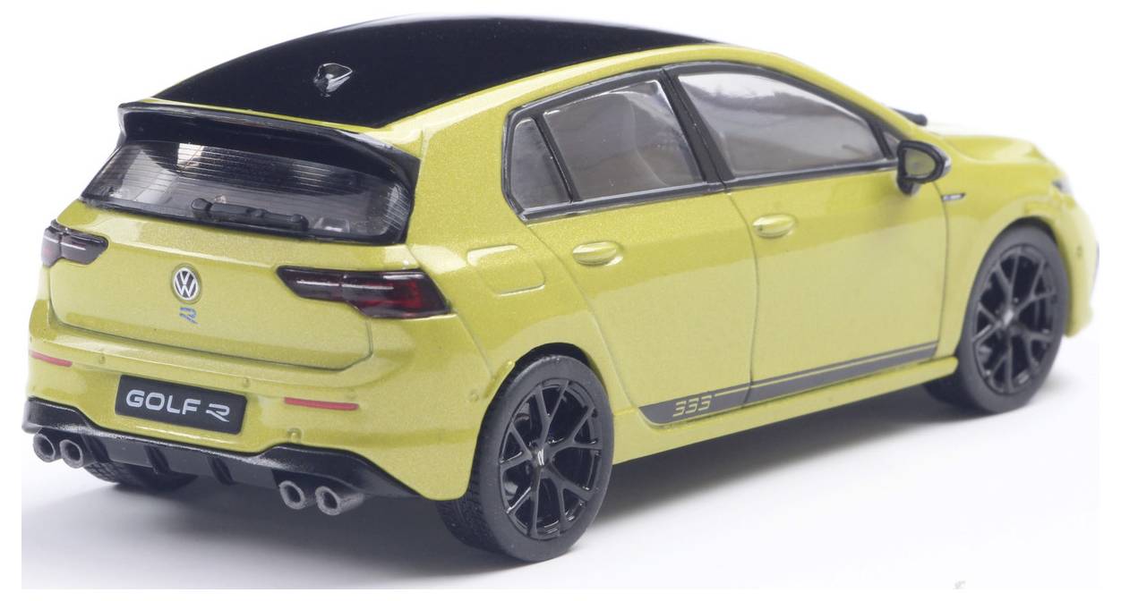 A yellow Volkswagen Golf R model car shown from the rear side, highlighting its sleek design, black roof, and dual exhausts.