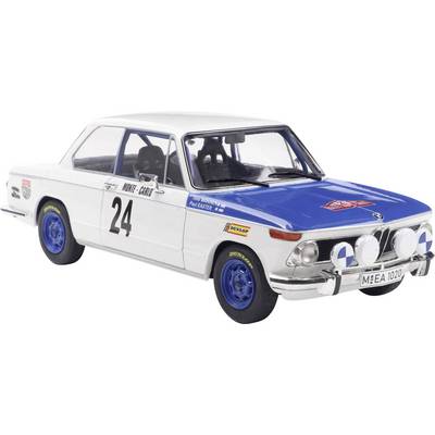 A vintage rally car with blue and white paint, the number '24' on the door, and combined decals including 'Monte Carlo'.