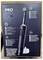 'Pro Vitality Black electric toothbrush with round brush head, 4 cleaning modes, long-lasting battery, and waterproof handle.'