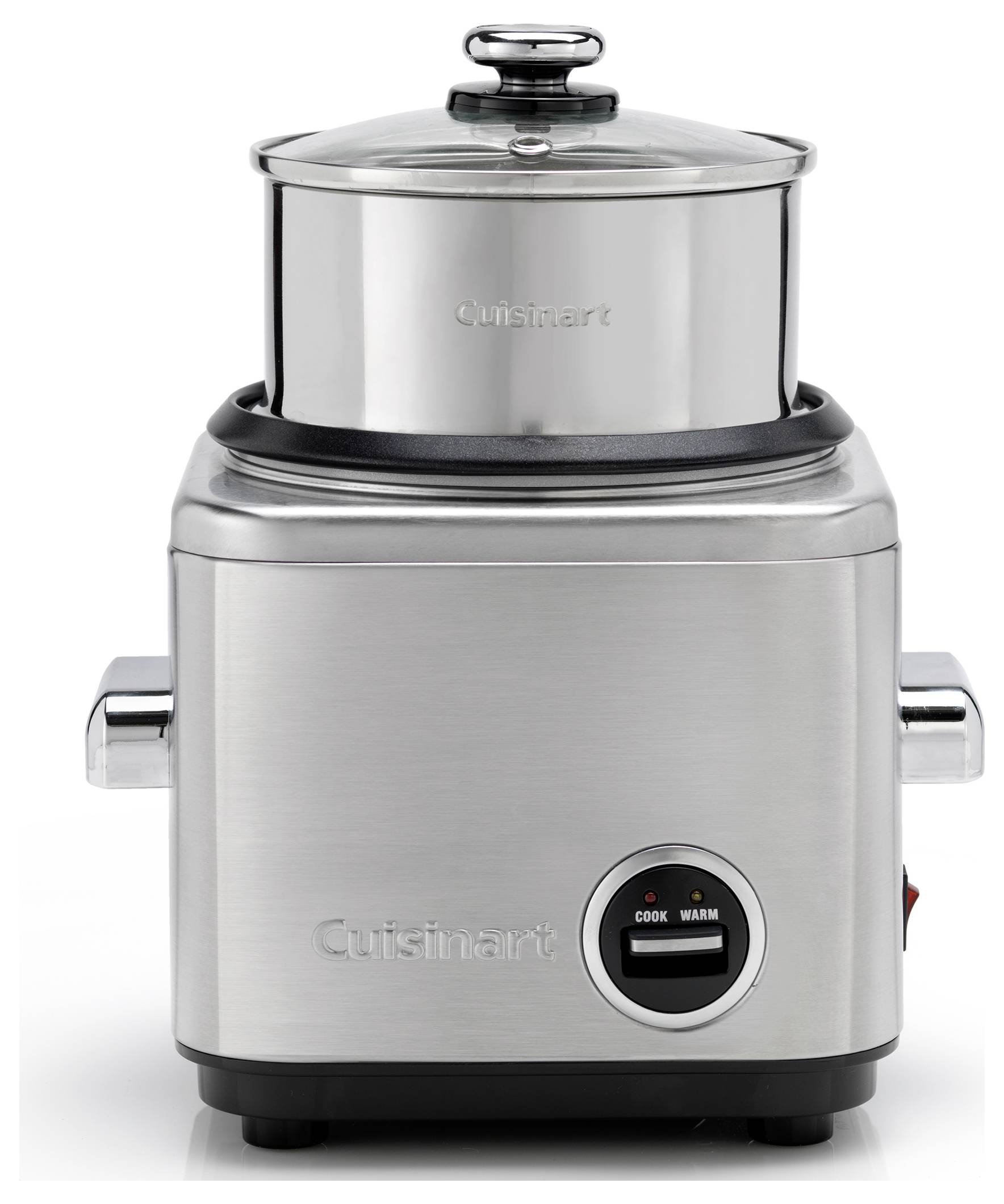 A stainless steel rice cooker with a cylindrical pot and glass lid, featuring a 'Cook/Warm' switch and side handles.