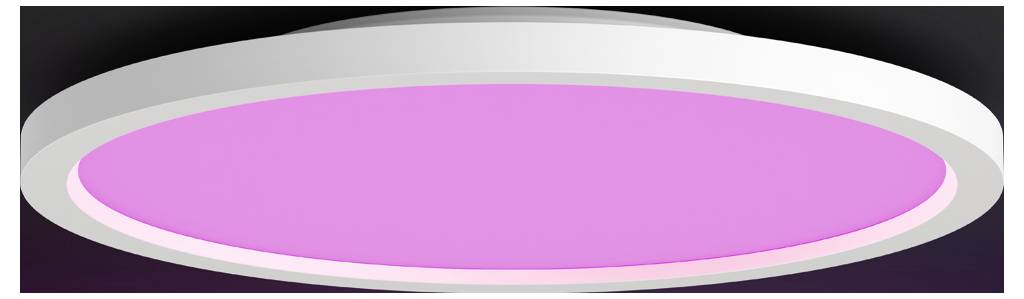 A round ceiling-mounted LED light fixture glows with a bright pink hue, set against a black background.