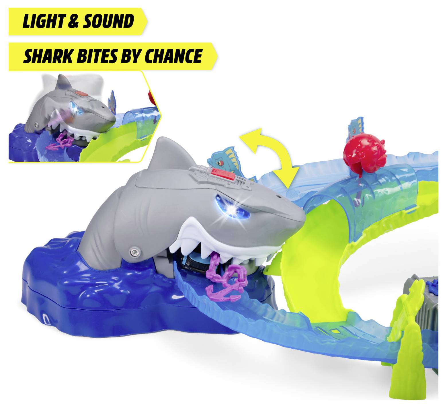Toy track set featuring a shark that surprises with light and sound; labeled 'Light & Sound' and 'Shark Bites by Chance'.