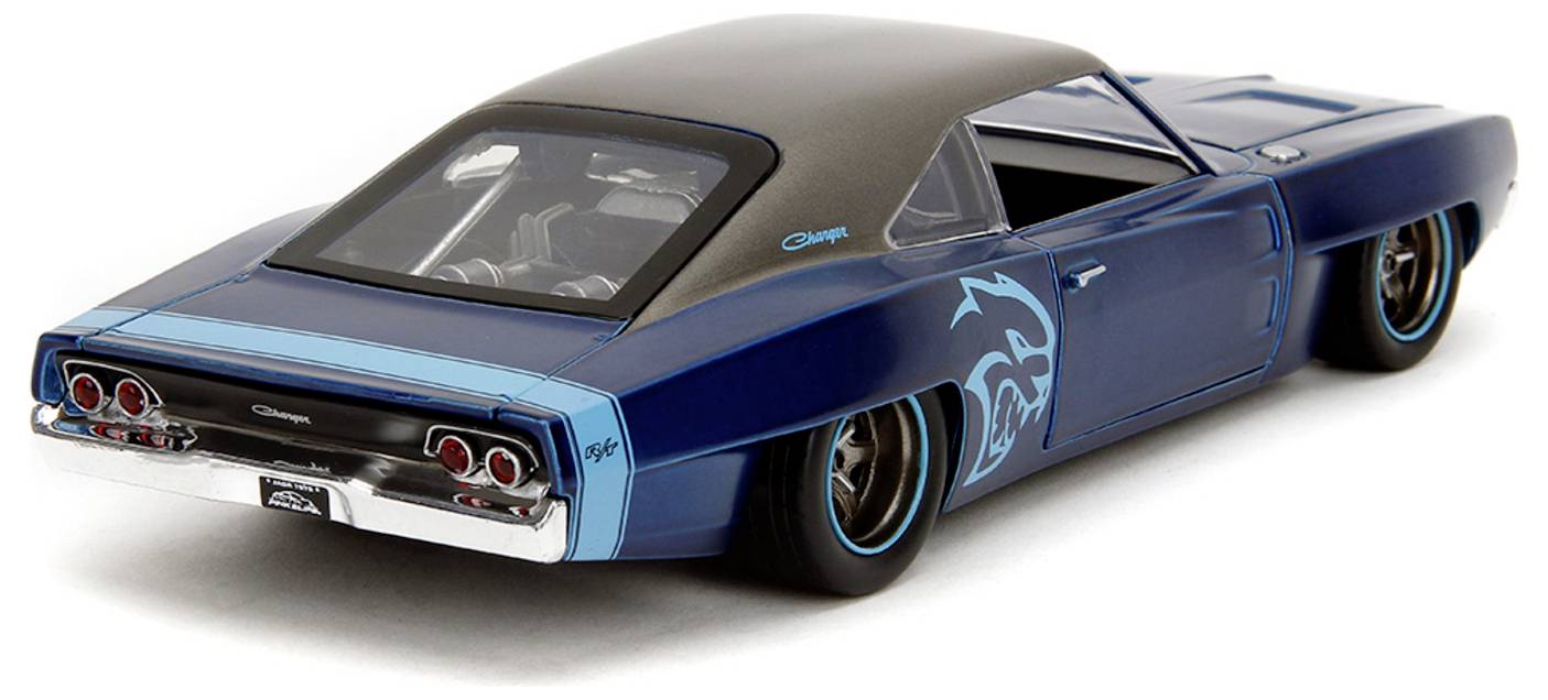 A classic blue muscle car with a black roof and dual exhausts is displayed. It features distinctive graphics on the side panels.