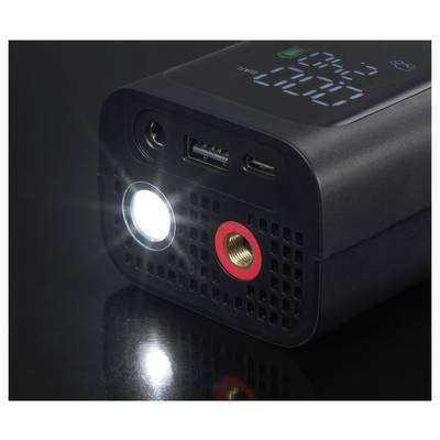 A portable digital tire inflator showing an illuminated flashlight, USB port, and pressure gauge on a dark background.