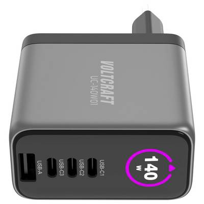 A black Voltcraft charger with four USB ports labeled USB-A, USB-C1, USB-C2, USB-C3. A '140 W' indicator is highlighted in pink.