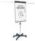 A flip chart on a stand displaying the text 'Let's start SKETCHING' with sketches of a light bulb, pencil, smartphone, and paper.