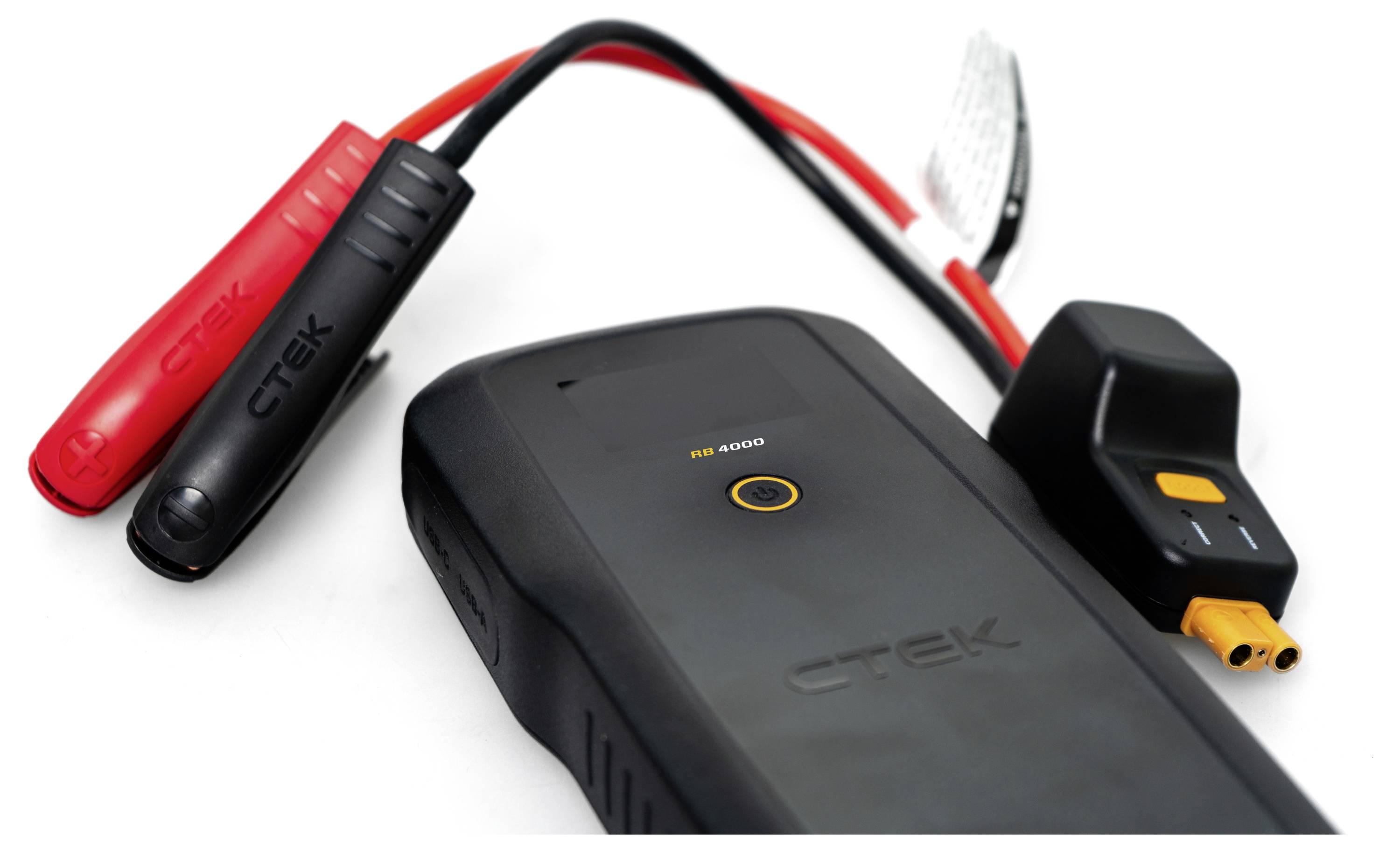 Portable battery charger with two clamps, one red and one black, and a connected charging cable.