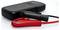 A portable battery charger with red and black clamps attached, used for charging or jump-starting a vehicle battery.