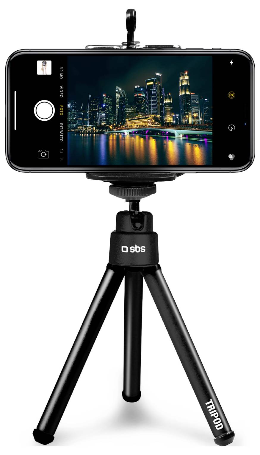 'Smartphone on tripod capturing city skyline at night with bright lights reflecting on water.'