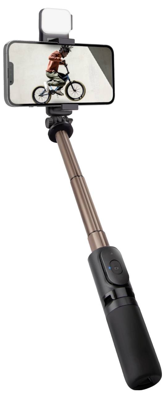 A smartphone on a selfie stick shows a video of a person performing a bicycle stunt.
