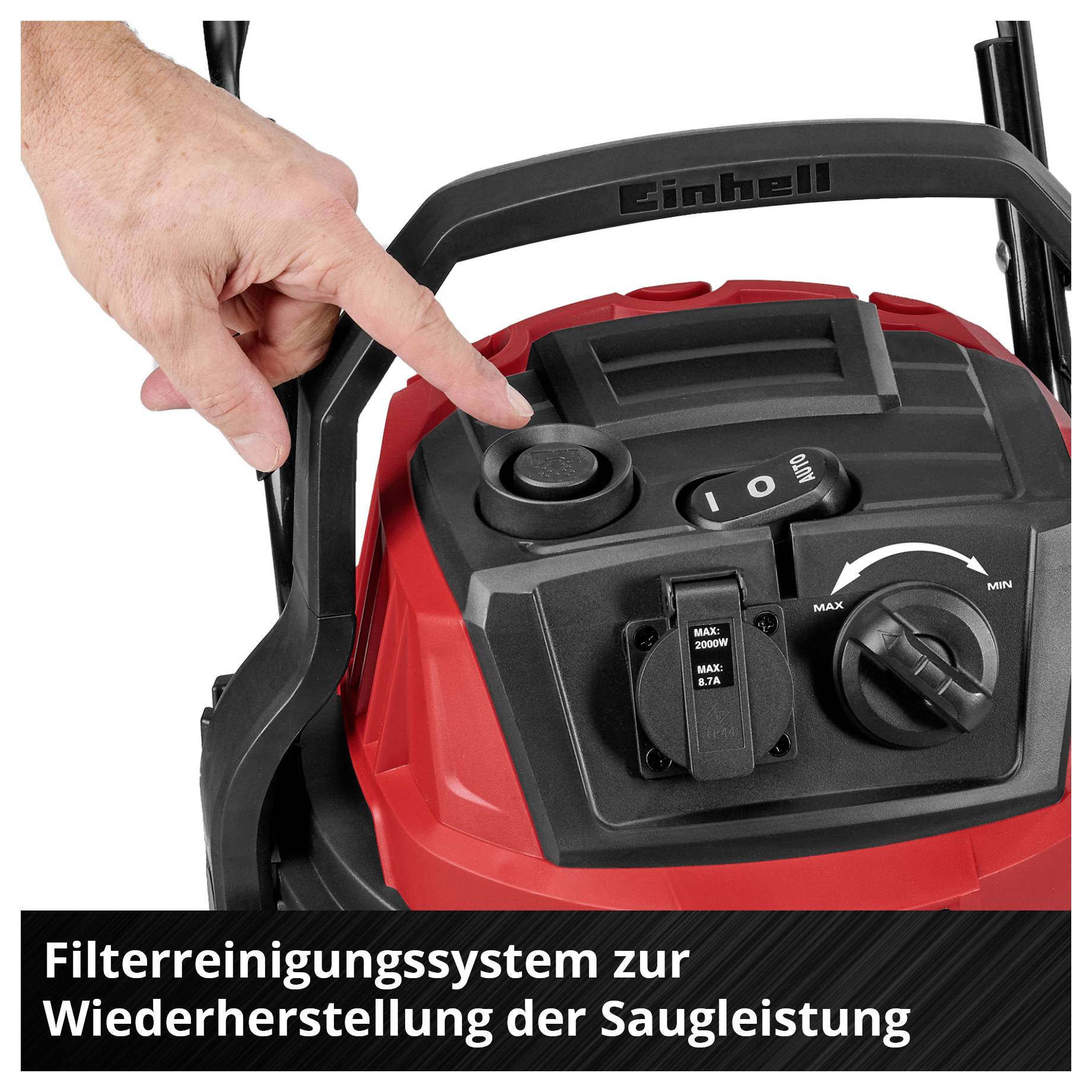 A vacuum cleaner with a filter cleaning system for restoring suction power. A hand points to the control elements.