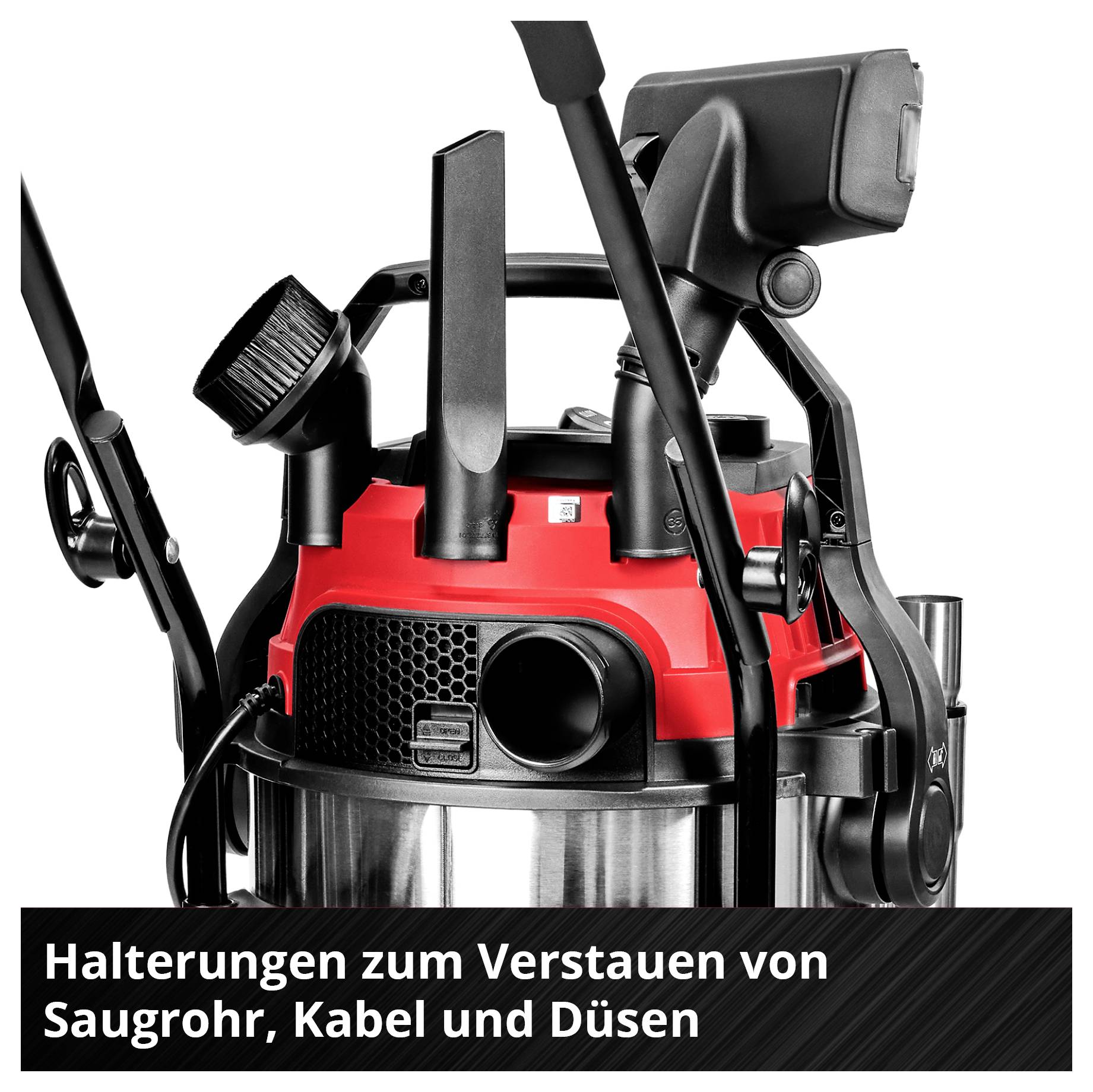 'Industrial vacuum cleaner with holders for storing suction tube, cable and nozzles.'