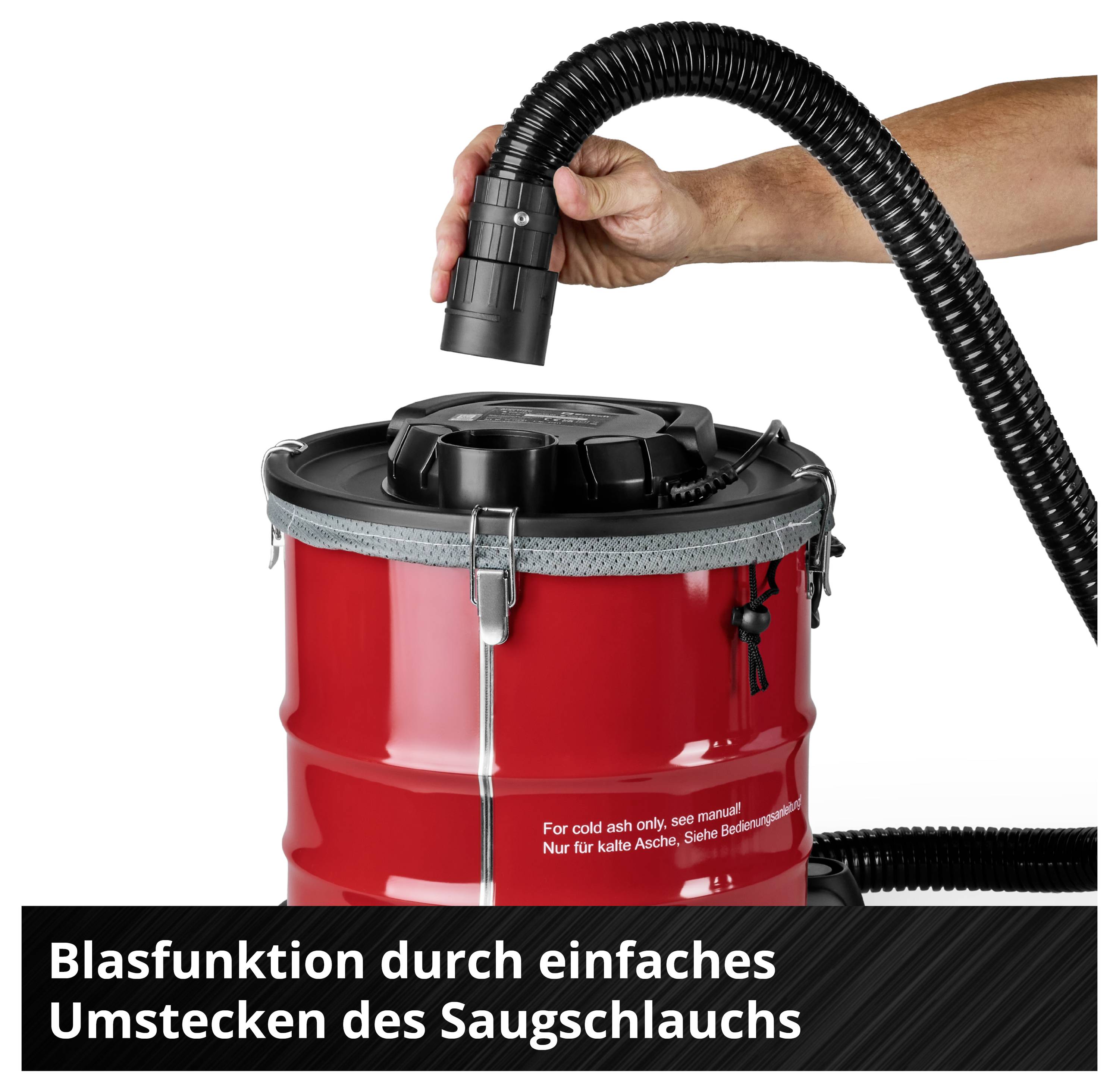 A red ash vacuum cleaner, whose blowing function is activated by switching the suction hose.