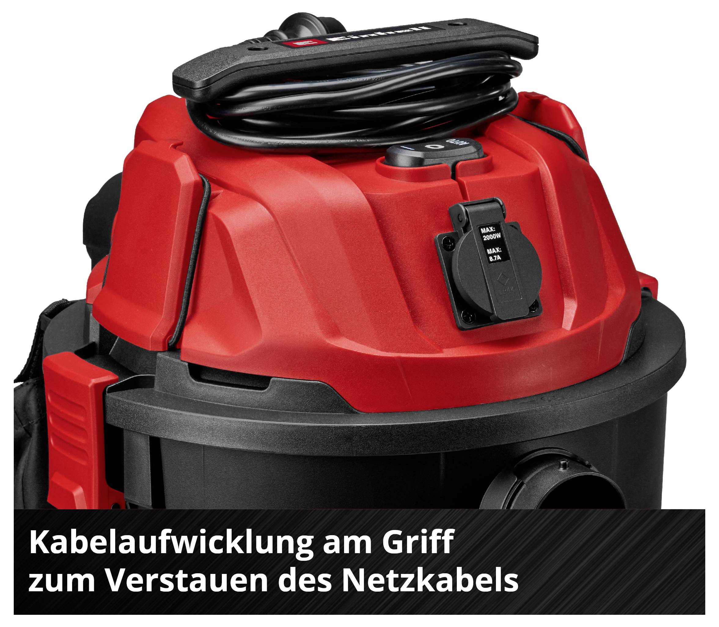 Red and black vacuum cleaner with cable winding mechanism on the handle for storing the power cable.
