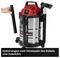 Wet and dry vacuum cleaner with stainless steel container, 20 litres, red top, black wheels and storage slots for accessories.