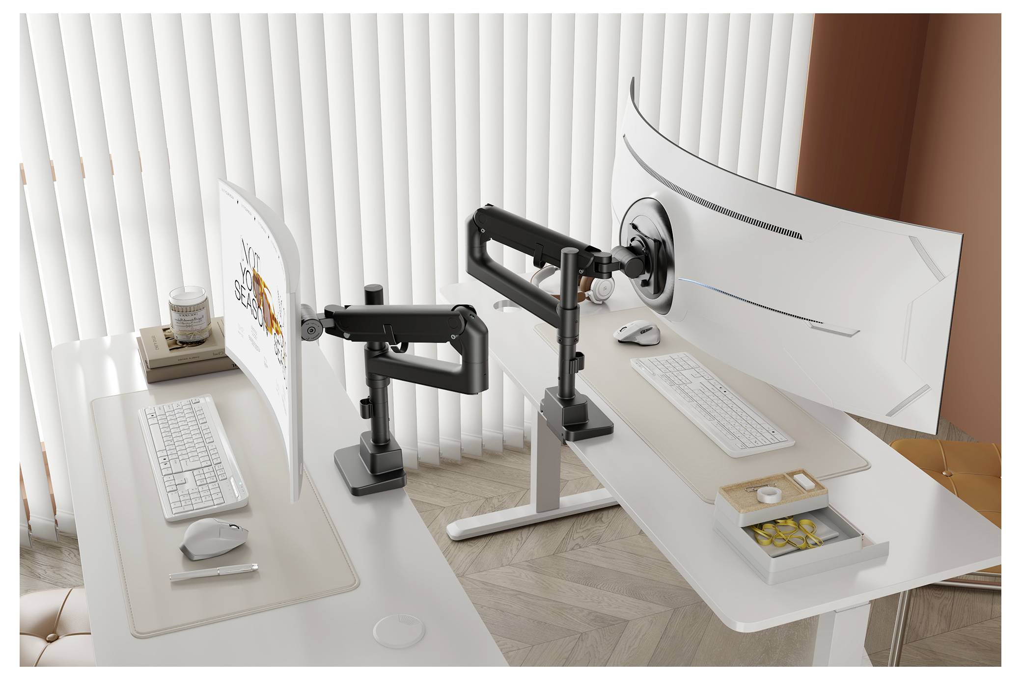 Two minimalist office desks with computer monitors on dual arm stands. Desks have keyboards, mice, and accessories in a bright room.