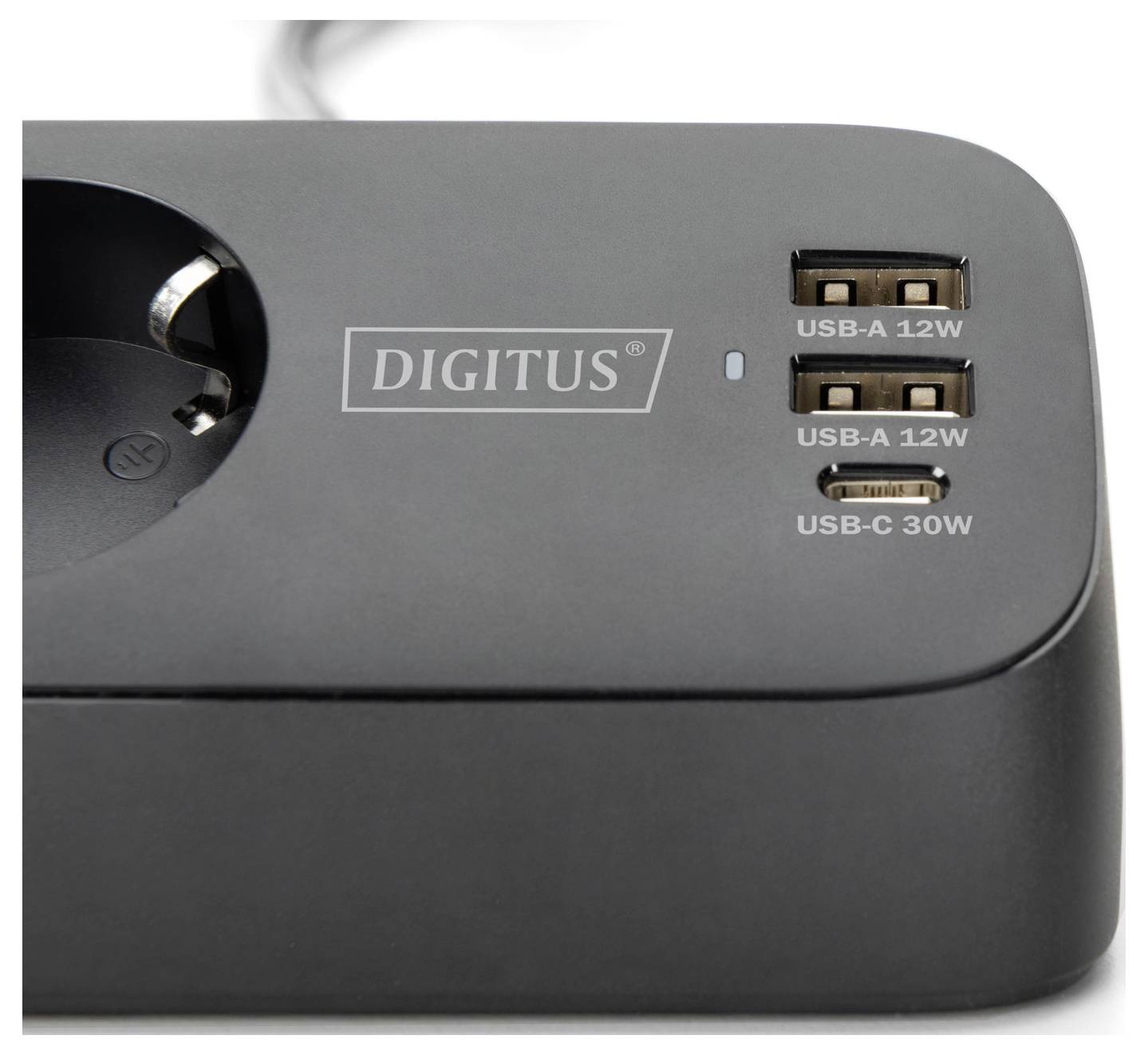 'A black power strip features one electrical socket, two USB-A ports labeled 12W each, and one USB-C port labeled 30W.'