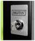 'A key inserted into a chrome lock on a metal plate labeled with the brand name Digitus, against a black and green background.'