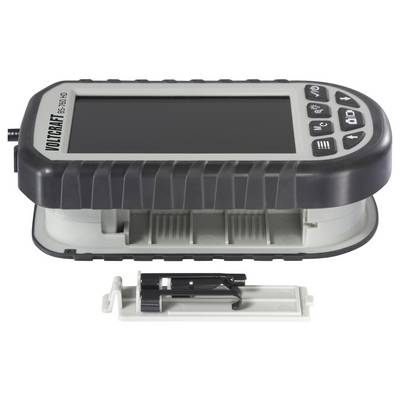 Handheld mobile device labeled 'VOICRAP? FS-7100' with a blank screen and buttons, shown with a detachable lower cartridge or battery tray below.