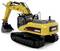 A yellow model excavator with a scooping arm and black treads, displaying 'Strong Power' and 'Amewi' on its body.