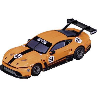 An orange Ford Mustang GT3 model car with '51' on the hood and sides, featuring a large rear spoiler and dark racing stripes.