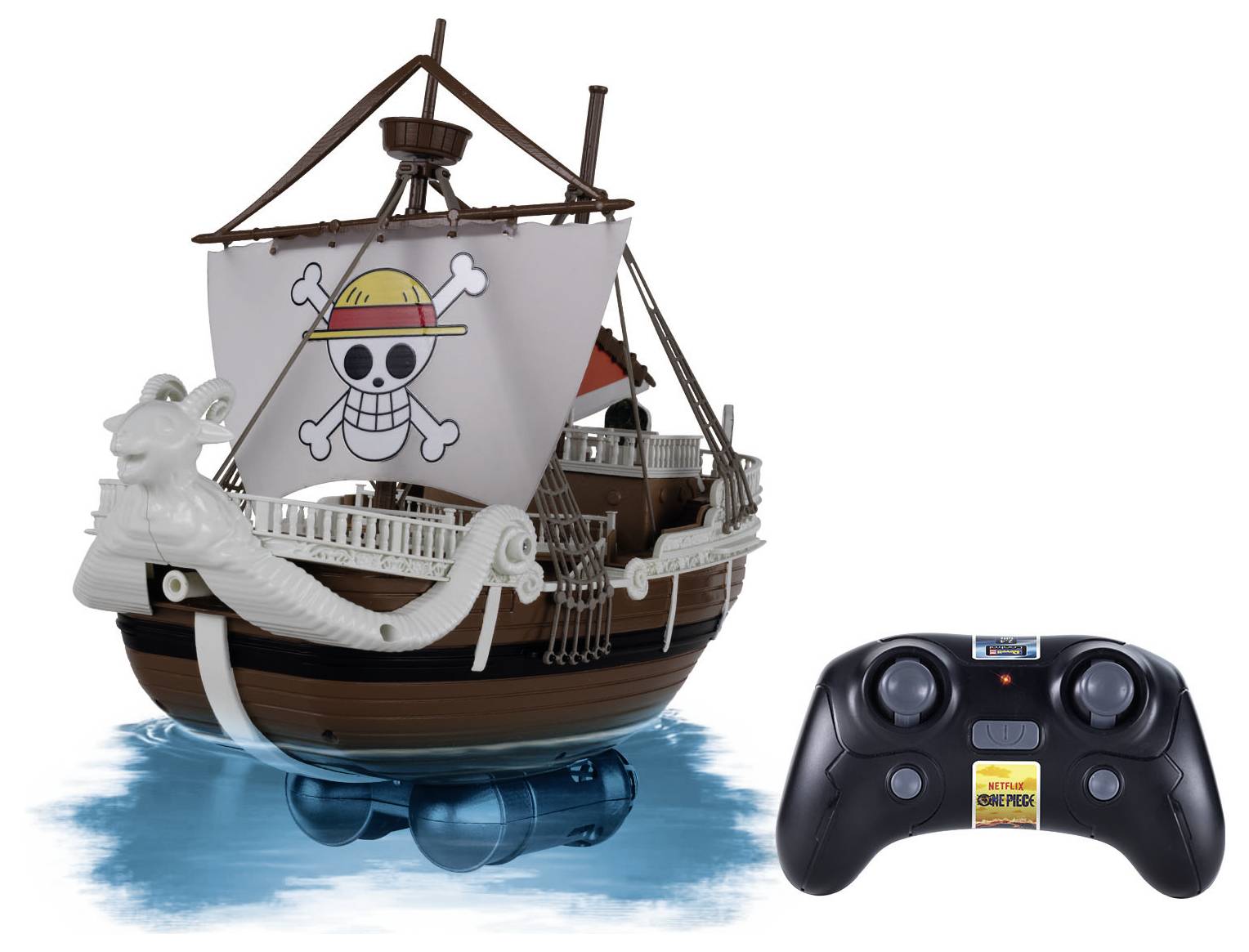 A remote-controlled toy ship with a pirate flag featuring a skull wearing a hat. A black remote is shown next to the ship.