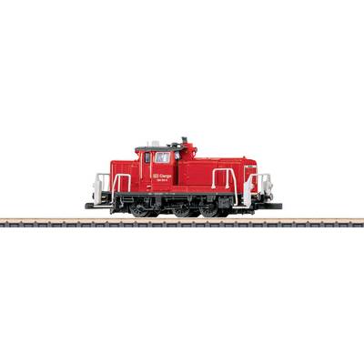 A red cargo train model on display, featuring detailed railings and wheels, situated on a short piece of track against a white background.