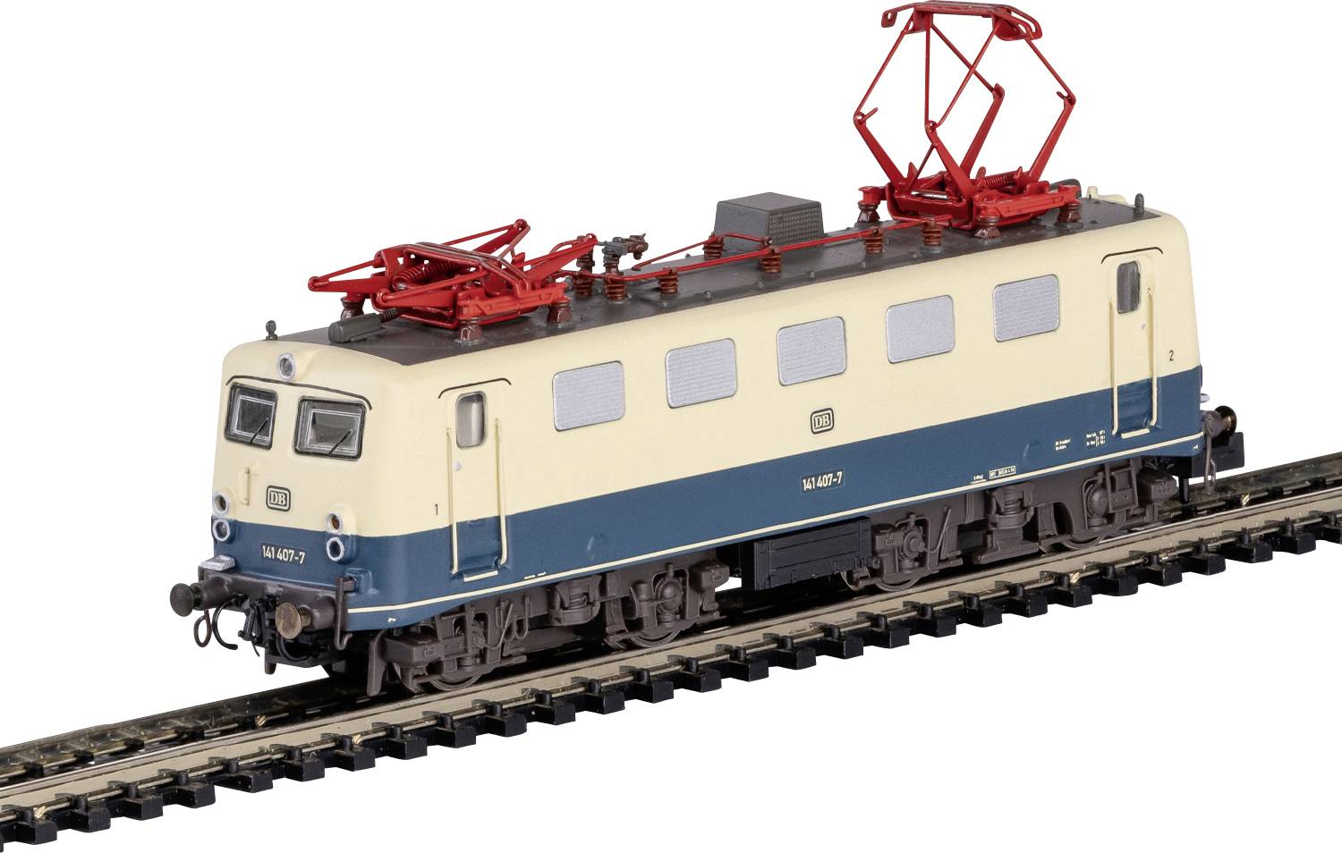 Model electric train in beige and blue with red pantographs on standard gauge track.