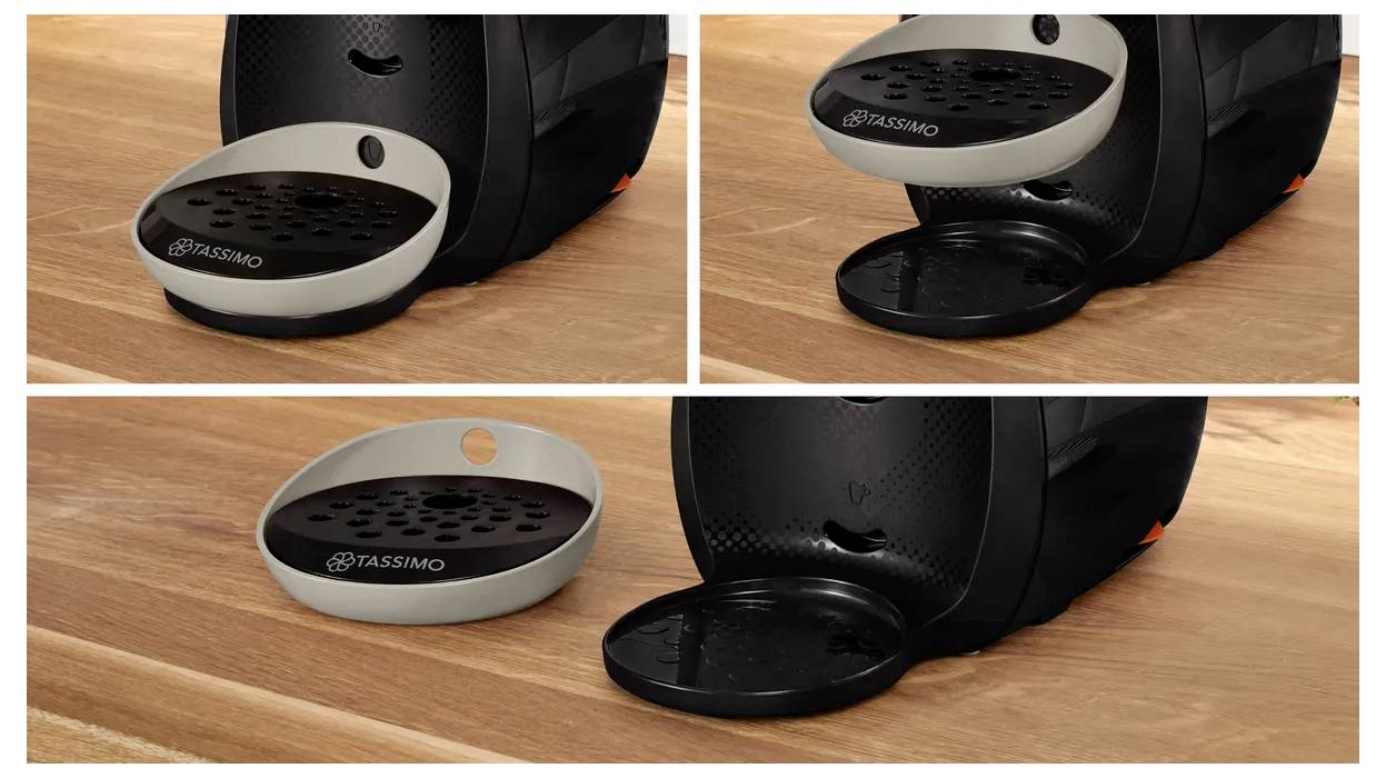 'Coffee machine with a removable drip tray in beige and black variations on a wooden countertop.'