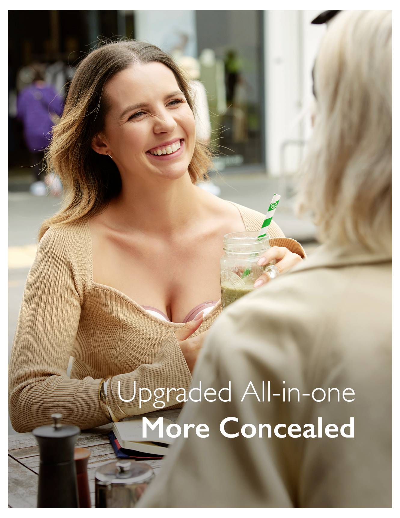 A woman smiling while holding a drink, facing another person. Text reads 'Upgraded All-in-one More Concealed.'