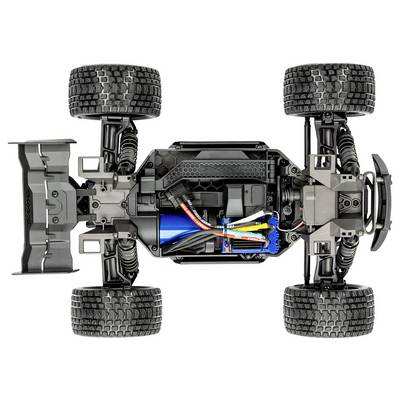 A top view of a remote-controlled car chassis showing the internal components including the wiring, battery pack, and suspension system.