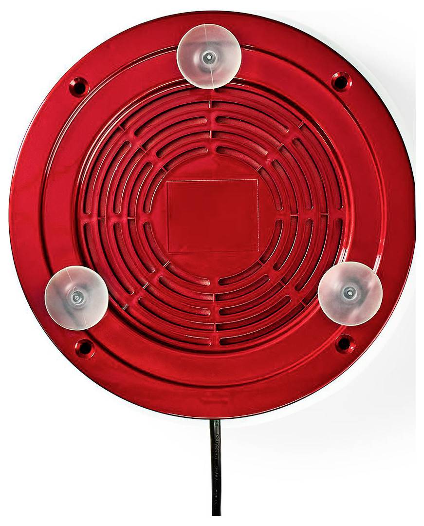 A red circular siren with a gridded cover and three suction cups is mounted on a wall. A black cord extends from its base.