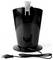 A black electric kettle with a sleek design, featuring a metallic handle, sits on a white surface. The power cord is visible in front.