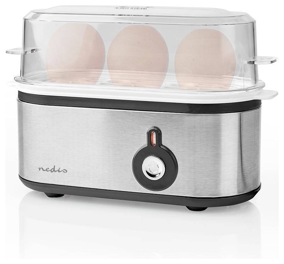 An electric egg boiler with a stainless steel base and transparent lid, containing three visible eggs positioned vertically.