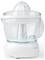 A clear plastic and white electric citrus juicer with lid and handle, on a countertop.