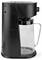 A black, modern coffee maker with a clear glass carafe showing measurement markers.