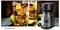 'Gastronoma' branded iced tea maker with two glasses of iced tea and lime slices beside it, highlighting beverage preparation.